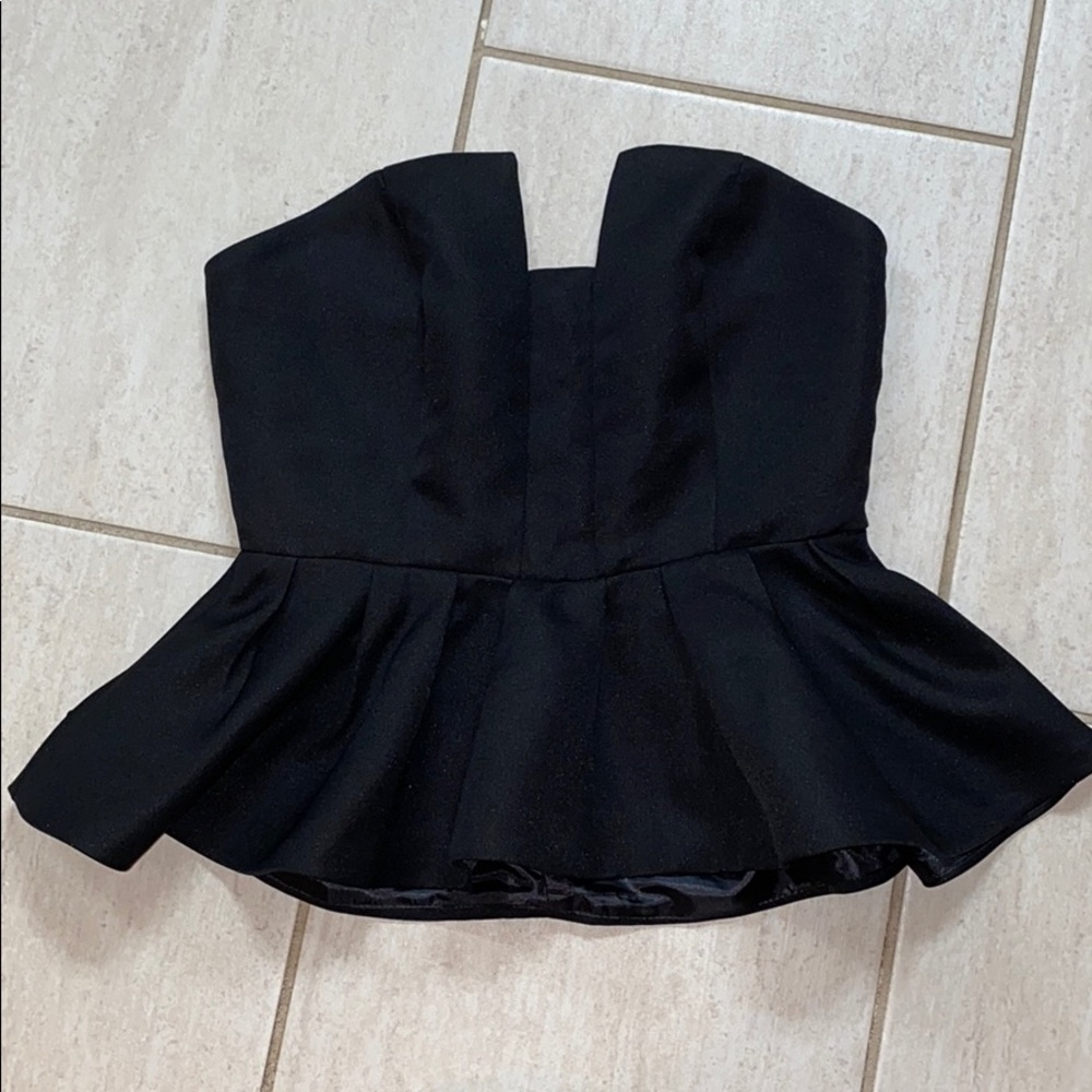 Black strapless peplum top